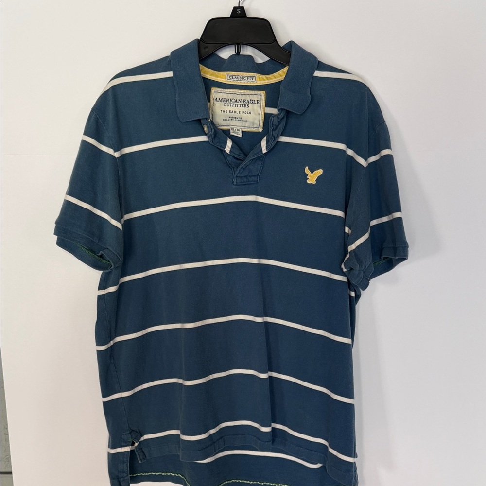 American Eagle Outfitters Navy Blue and White Striped Polo with Yellow Logo